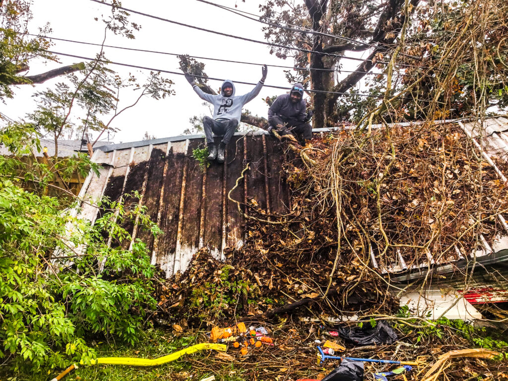 HBS Junk Removal Team Members Taking Down and Removing a Shed in Mandeville, Louisiana