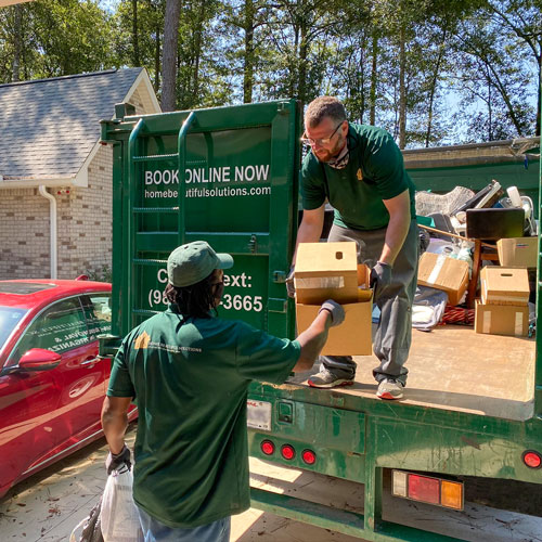 HBS Junk Removal Team Members Completing Junk Removal in Ponchatoula and Removing a Customer's Items