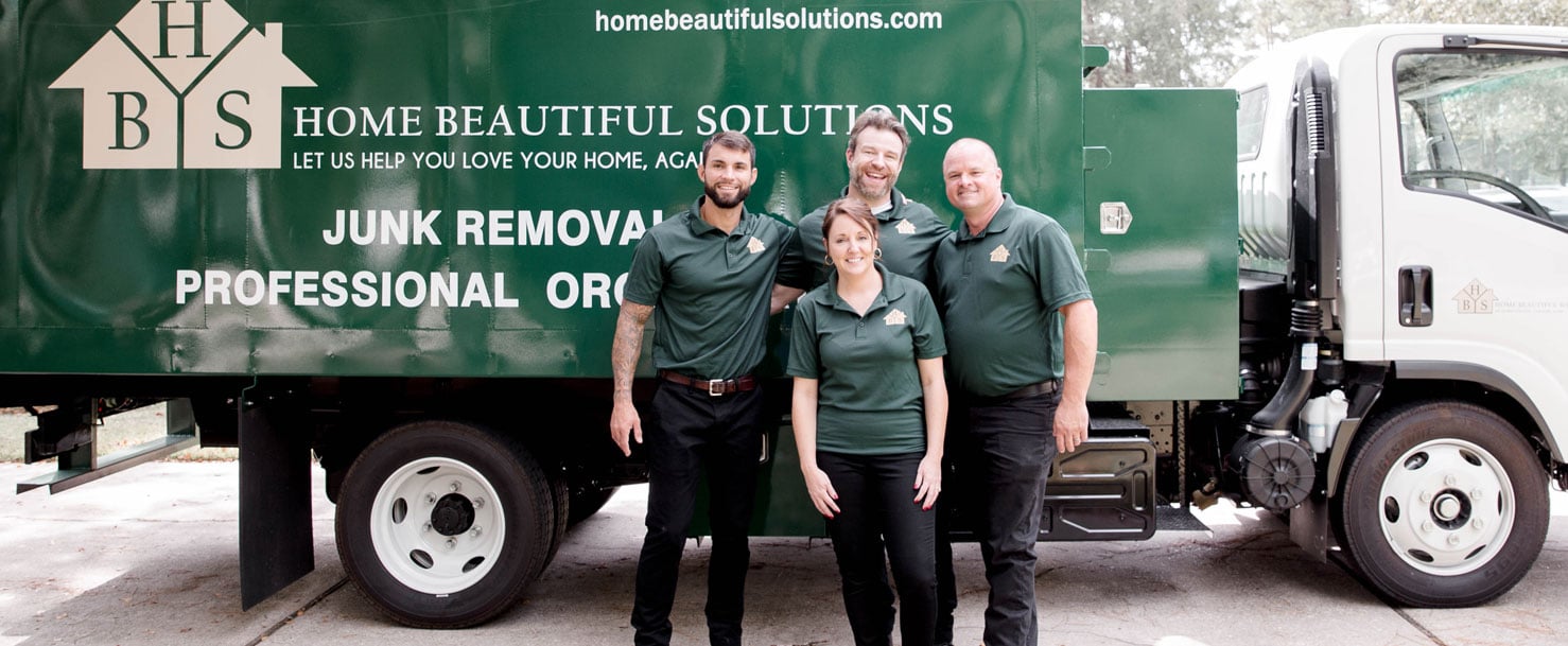 HBS Junk Removal Team Pausing for a Photo in Front of the Truck for Mandeville Junk Removal